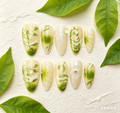 🌿 Holiday Vibe Fresh Green Floral Almond Nails